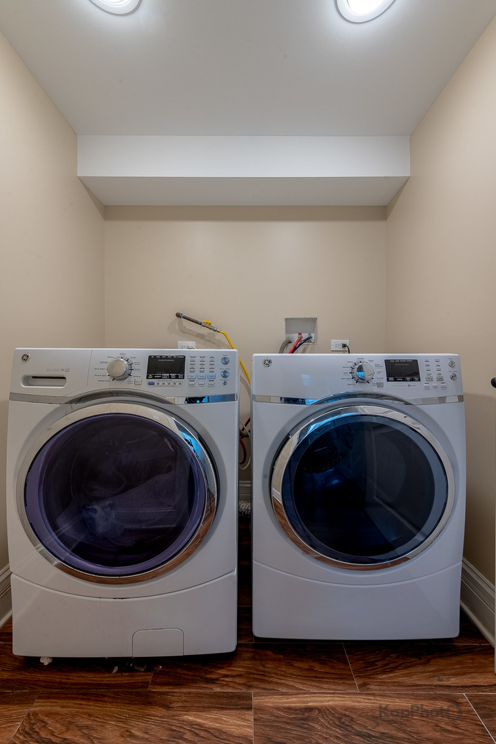 3639 North Troy Street, Unit 2 Chicago, IL 60618 - Photo 28 of 30 a utility room with sink dryer and washer