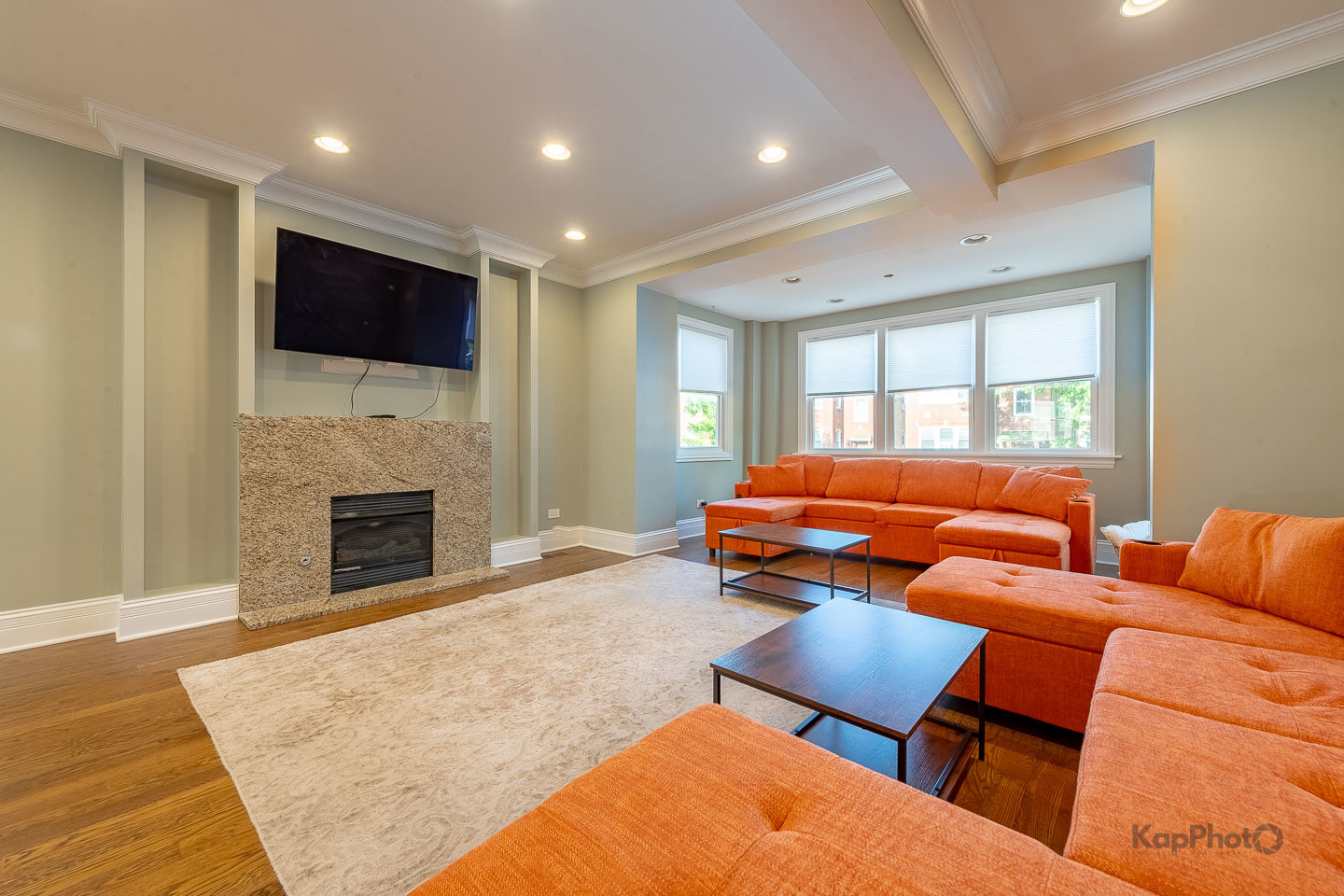 3639 North Troy Street, Unit 2 Chicago, IL 60618 - Photo 4 of 30 a bedroom with furniture and a fireplace