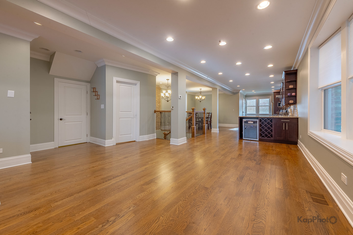 3639 North Troy Street, Unit 2 Chicago, IL 60618 - Photo 6 of 30 a view of a big room with wooden floor and windows