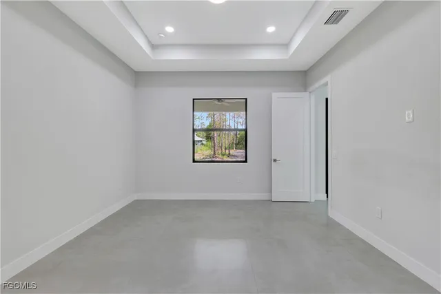 an empty room with windows