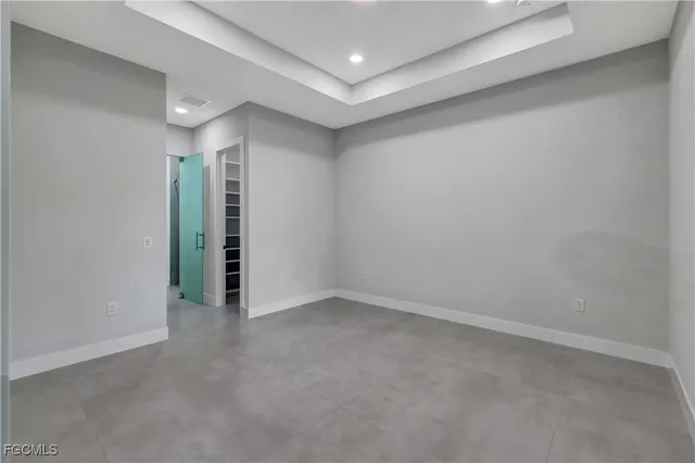 a view of an empty walk in closet