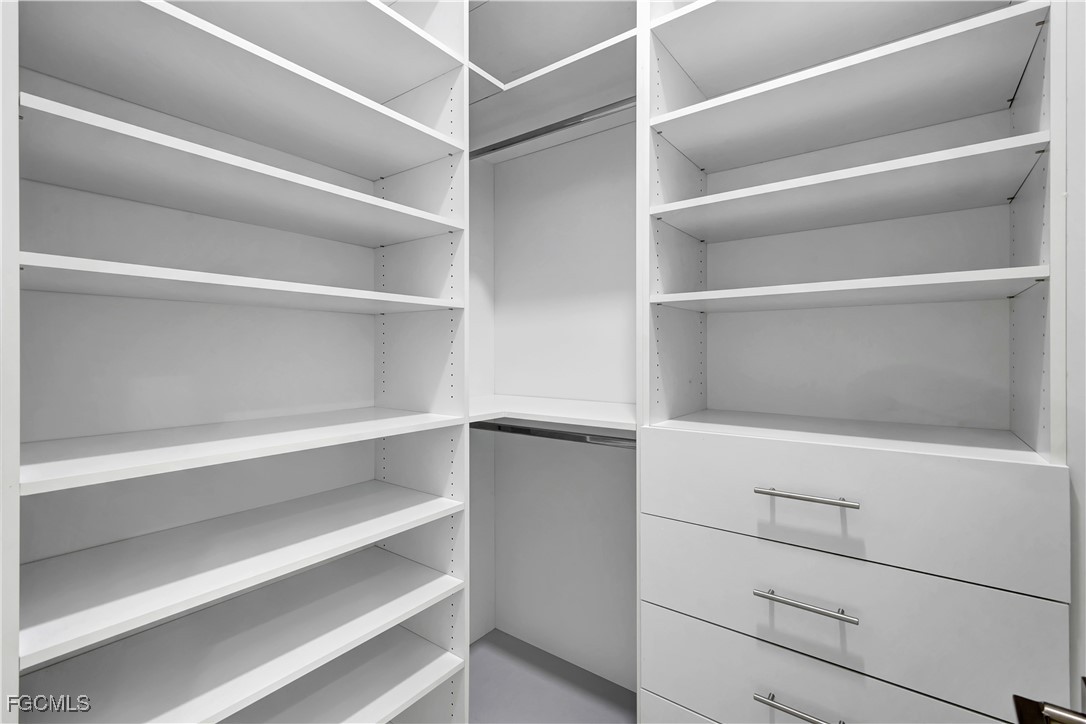 3366 72nd Avenue Northeast Naples, FL 34120 - Photo 15 of 49 a view of an empty walk in closet