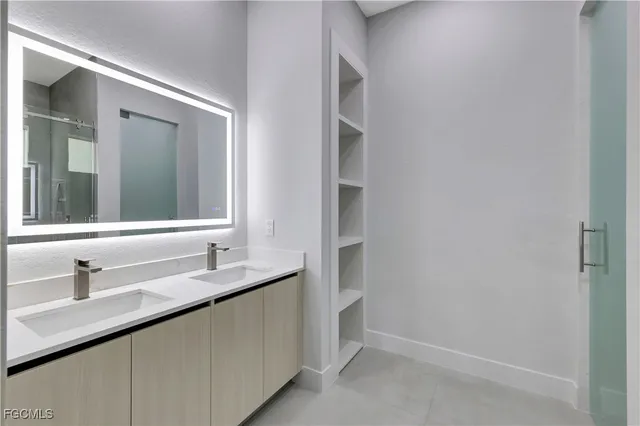 an empty room with closet area