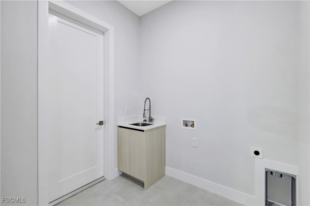 3366 72nd Avenue Northeast Naples, FL 34120 - Photo 29 of 49 a view of small space with racks on the wall