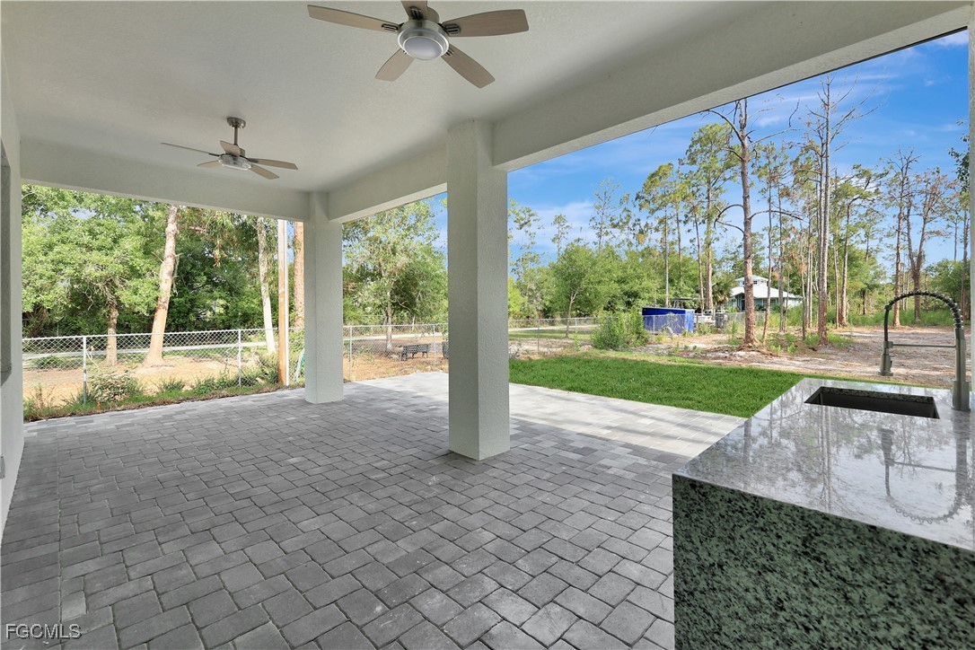 3366 72nd Avenue Northeast Naples, FL 34120 - Photo 32 of 49 a view of a porch with a backyard