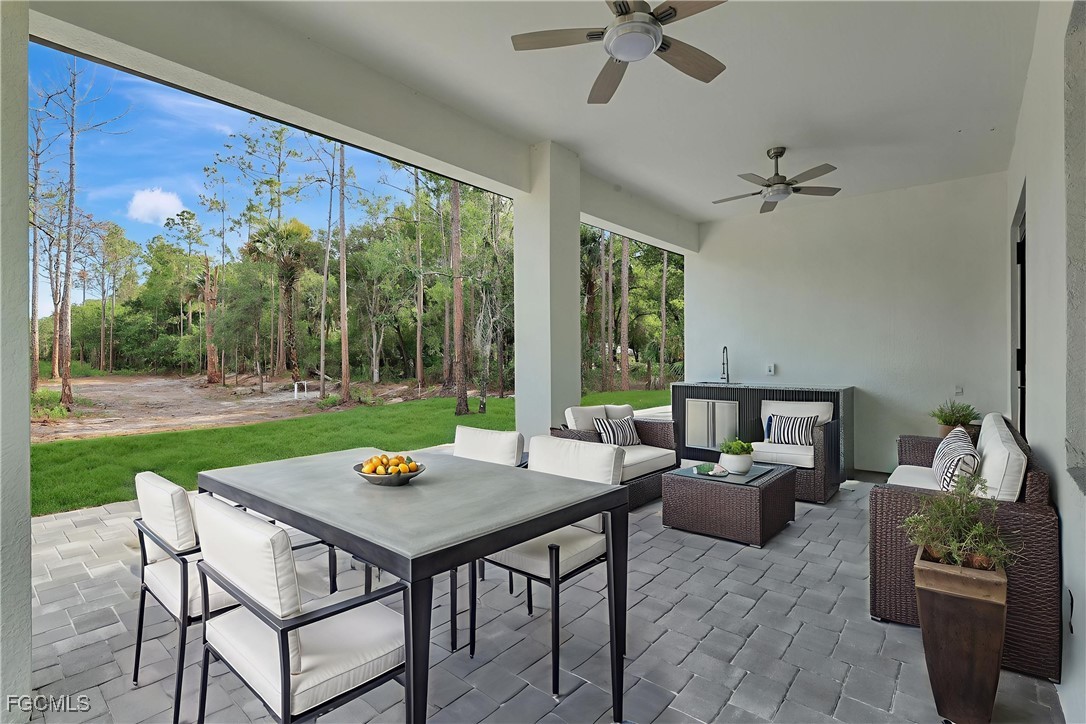 3366 72nd Avenue Northeast Naples, FL 34120 - Photo 34 of 49 a outdoor space with furniture