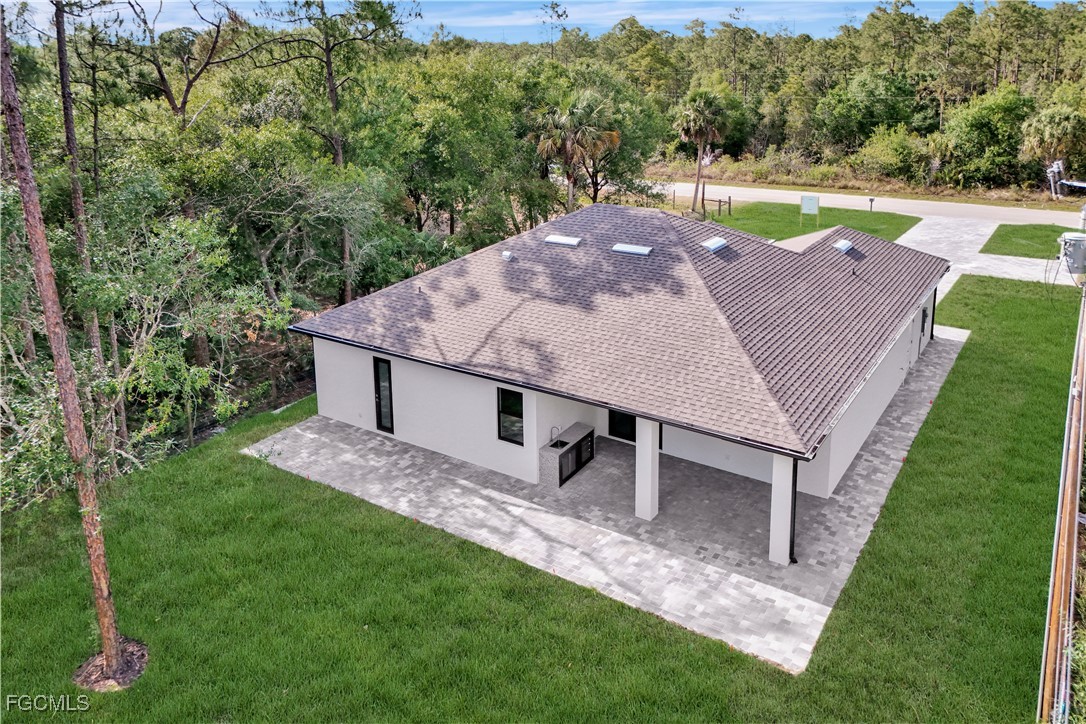 3366 72nd Avenue Northeast Naples, FL 34120 - Photo 37 of 49 an aerial view of a house with big yard