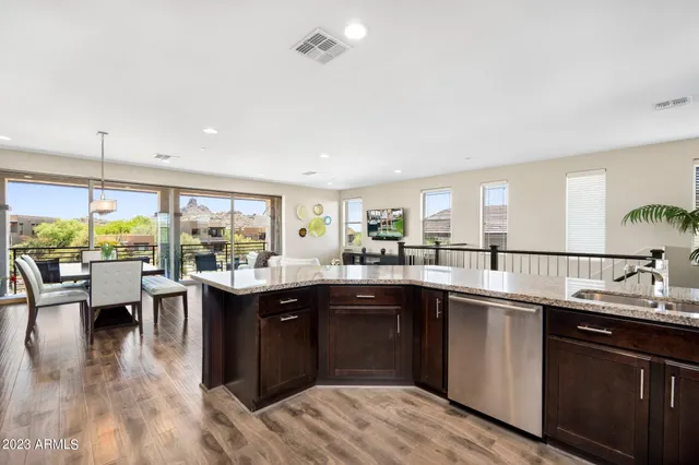 a bedroom with a bed and a table