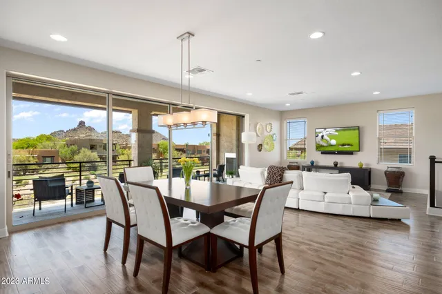 a kitchen with kitchen island a counter space a sink and refrigerator
