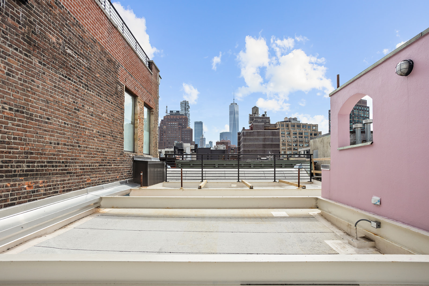 169 Spring Street, Unit 5W Manhattan, NY 10012 - Photo 18 of 20 a view of a multi story building