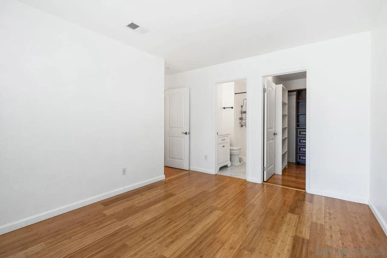 14215 Sutter Mill Way Poway, CA 92064 - Photo 10 of 38 a view of a room with wooden floor