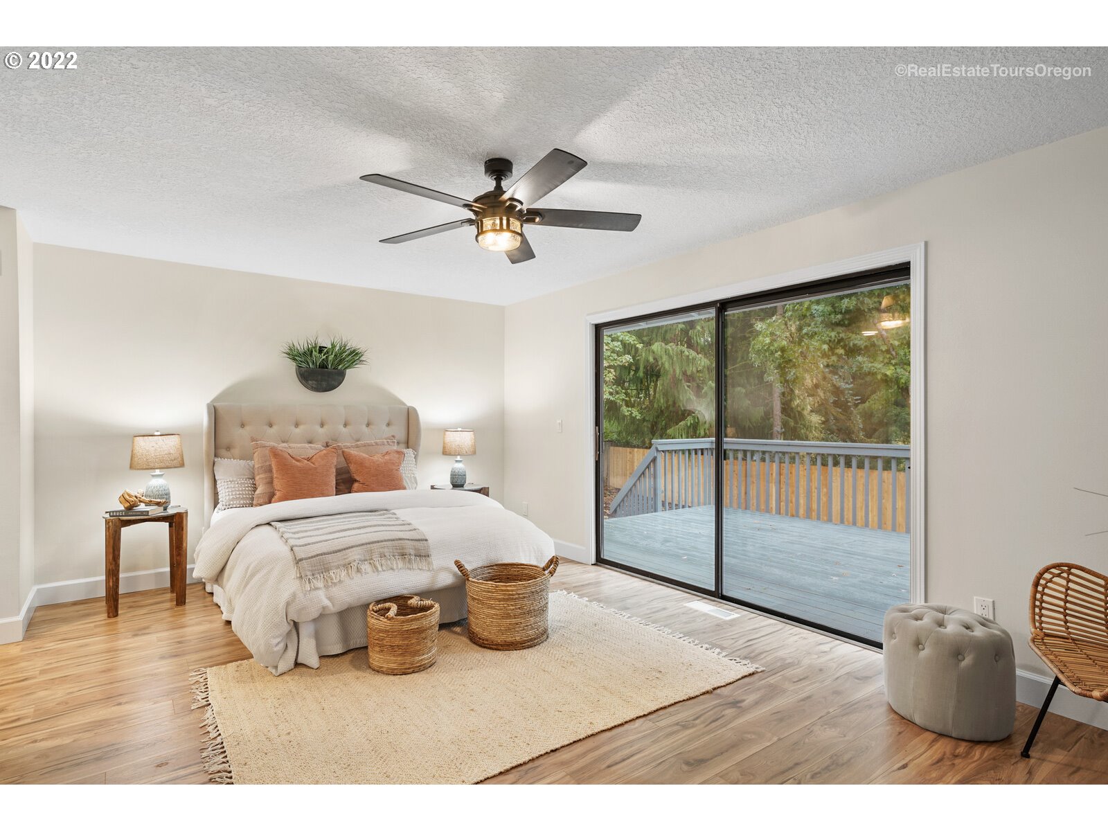 11280 Southwest Viewmount Court Tigard, OR 97223 - Photo 15 of 31 a bedroom with a bed and wooden floor