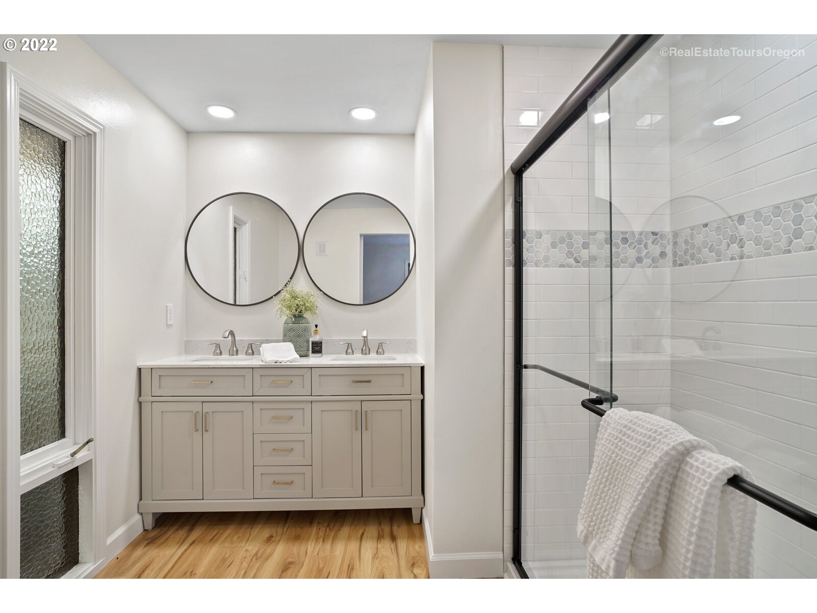 11280 Southwest Viewmount Court Tigard, OR 97223 - Photo 18 of 31 a bathroom with a double vanity sink and a mirror