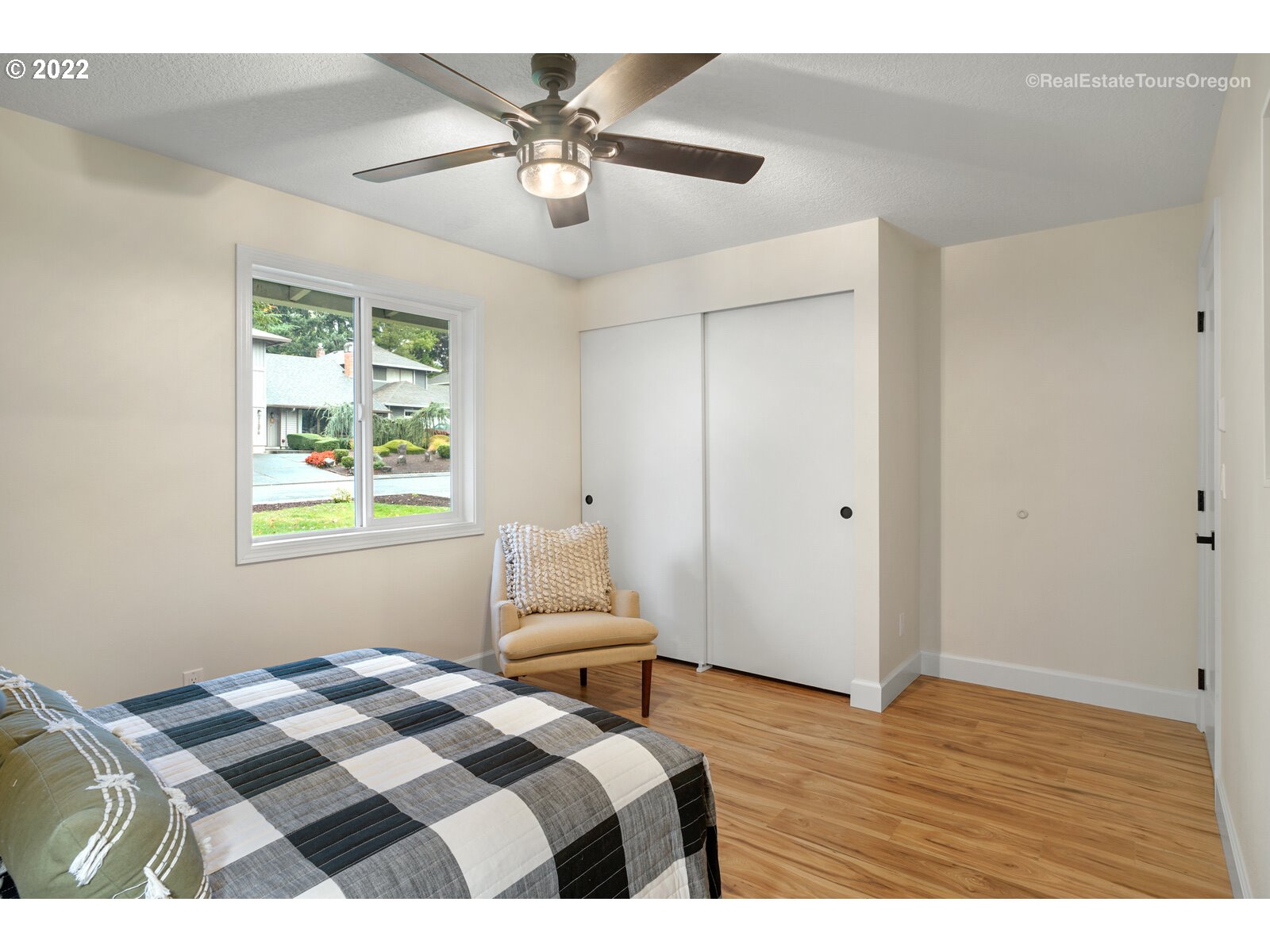 11280 Southwest Viewmount Court Tigard, OR 97223 - Photo 20 of 31 a bedroom with a bed and a window