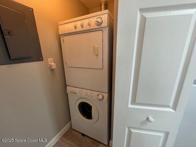 5692 Star Rush Drive, Unit 106 Melbourne, FL 32940 - Photo 5 of 16 a utility room with dryer and washer