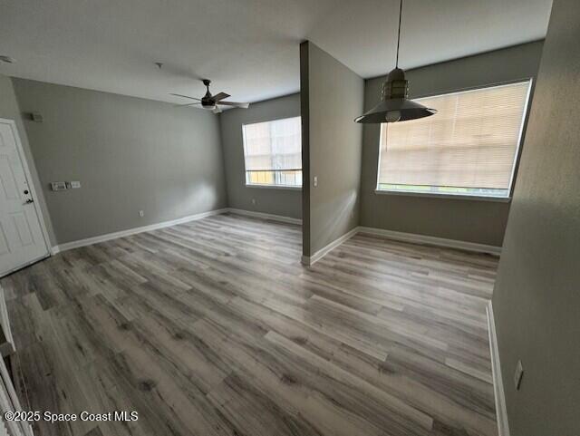 5692 Star Rush Drive, Unit 106 Melbourne, FL 32940 - Photo 7 of 16 a view of an empty room with a window