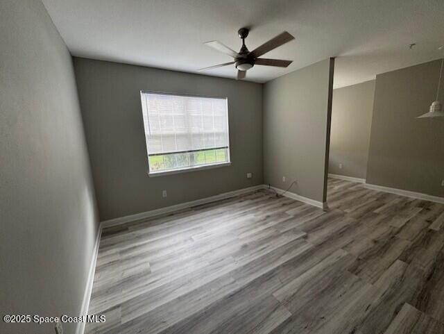 5692 Star Rush Drive, Unit 106 Melbourne, FL 32940 - Photo 10 of 16 a view of an empty room with a window
