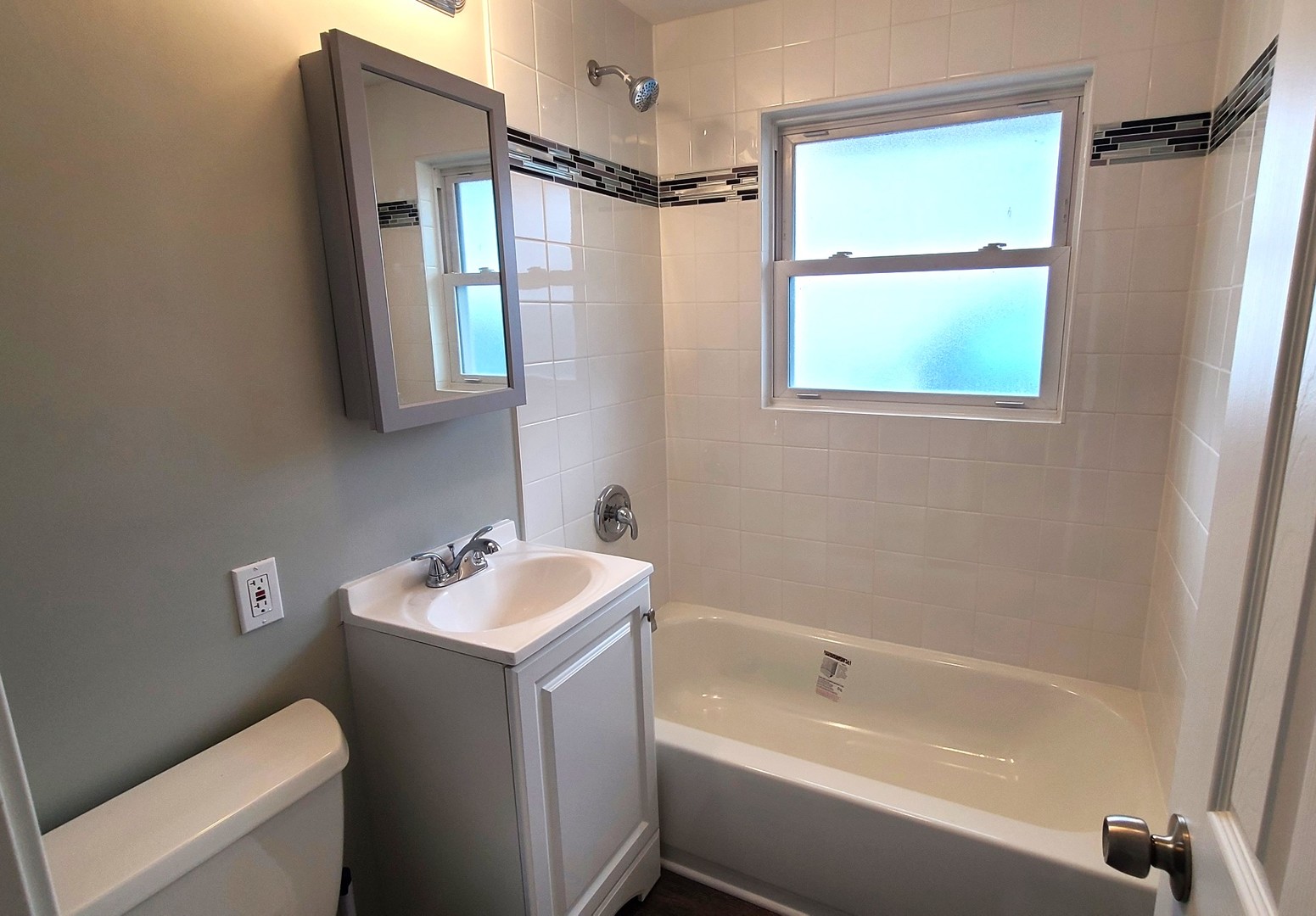 8790 South Corcoran Road, Unit 8790 Hometown, IL 60456 - Photo 10 of 14 a bathroom with a sink toilet and shower