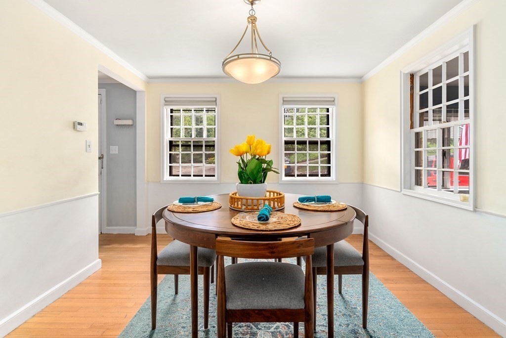 60 Valley Road Milton, MA 02186 - Photo 5 of 28 a view of a dining room with tables and chairs