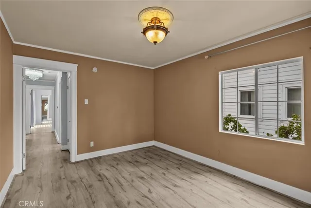 a bathroom with a granite countertop sink toilet a mirror and shower