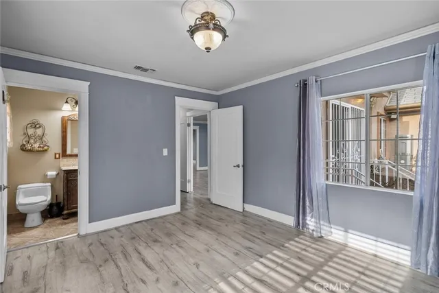 a bathroom with a sink a mirror and a shower