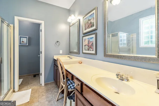 a bathroom with a tub and shower