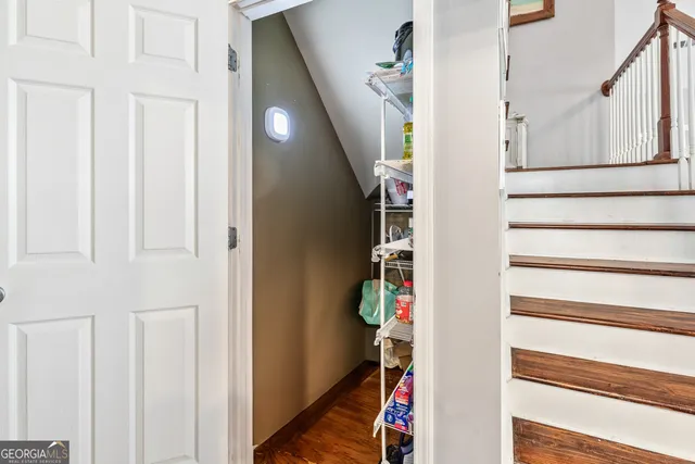 a view of a livingroom with furniture and wooden floor