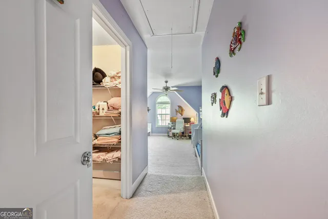 a view of a house with backyard sitting area and garden
