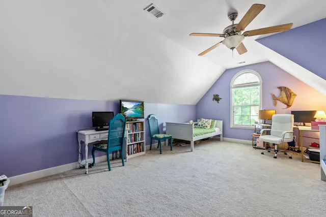 a view of a backyard with plants