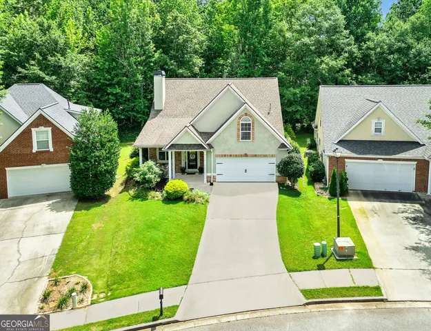 a view of a garden with a lake