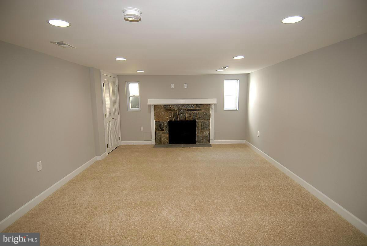 429 Rittenhouse Street Northwest Washington, DC 20011 - Photo 13 of 28 Basement w Fireplace
