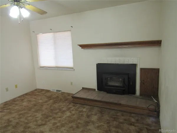 a room with a fireplace