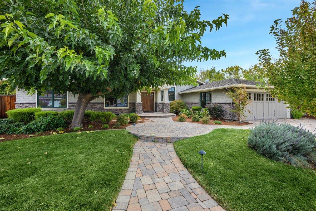 1863 Walnut Drive Mountain View, CA 94040 - Photo 2 of 7 a front view of a house with garden and a garden