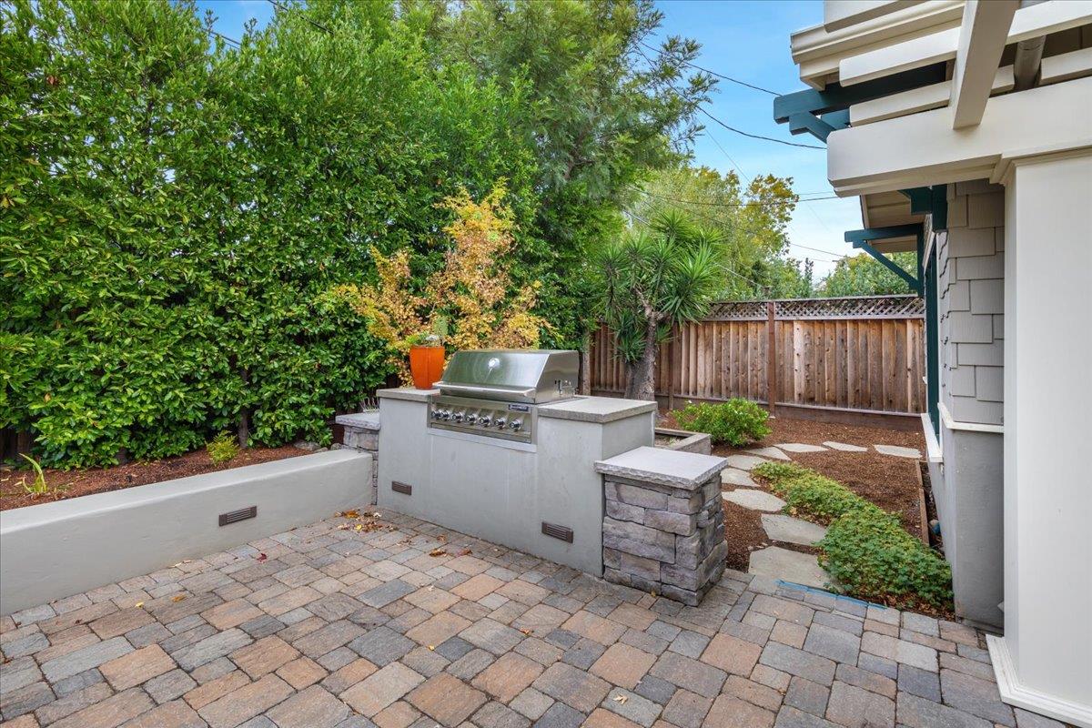 1863 Walnut Drive Mountain View, CA 94040 - Photo 5 of 7 a view of a backyard with chairs and a small yard