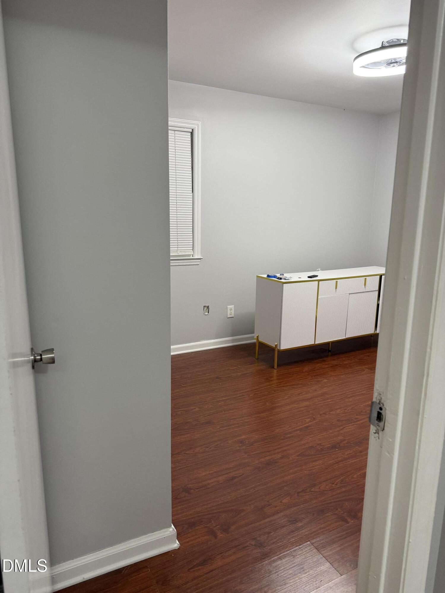 2800 Greenock Drive Raleigh, NC 27604 - Photo 13 of 20 wooden floor in an empty room