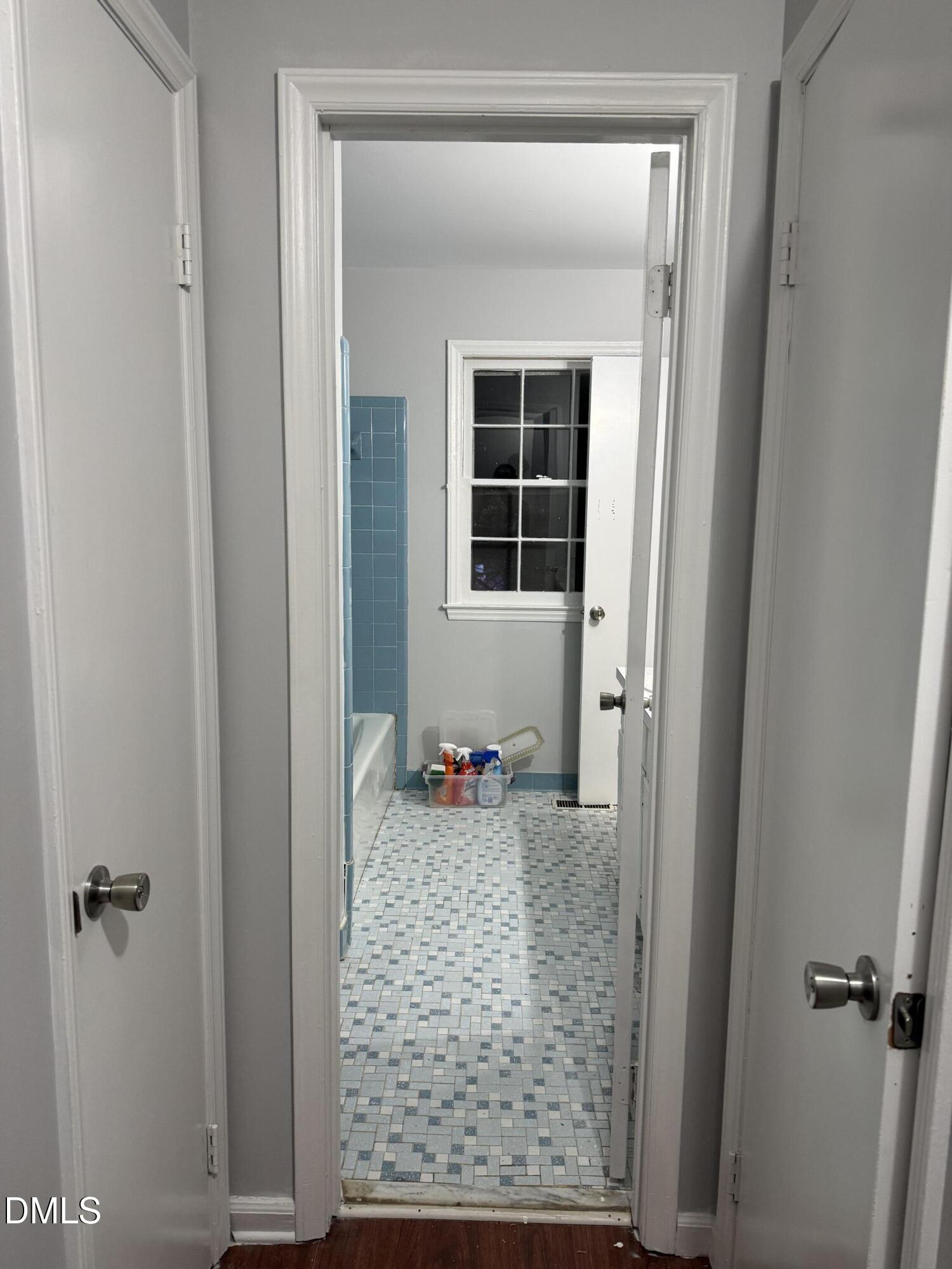 2800 Greenock Drive Raleigh, NC 27604 - Photo 19 of 20 a view of a hallway with wooden floor and a cabinet