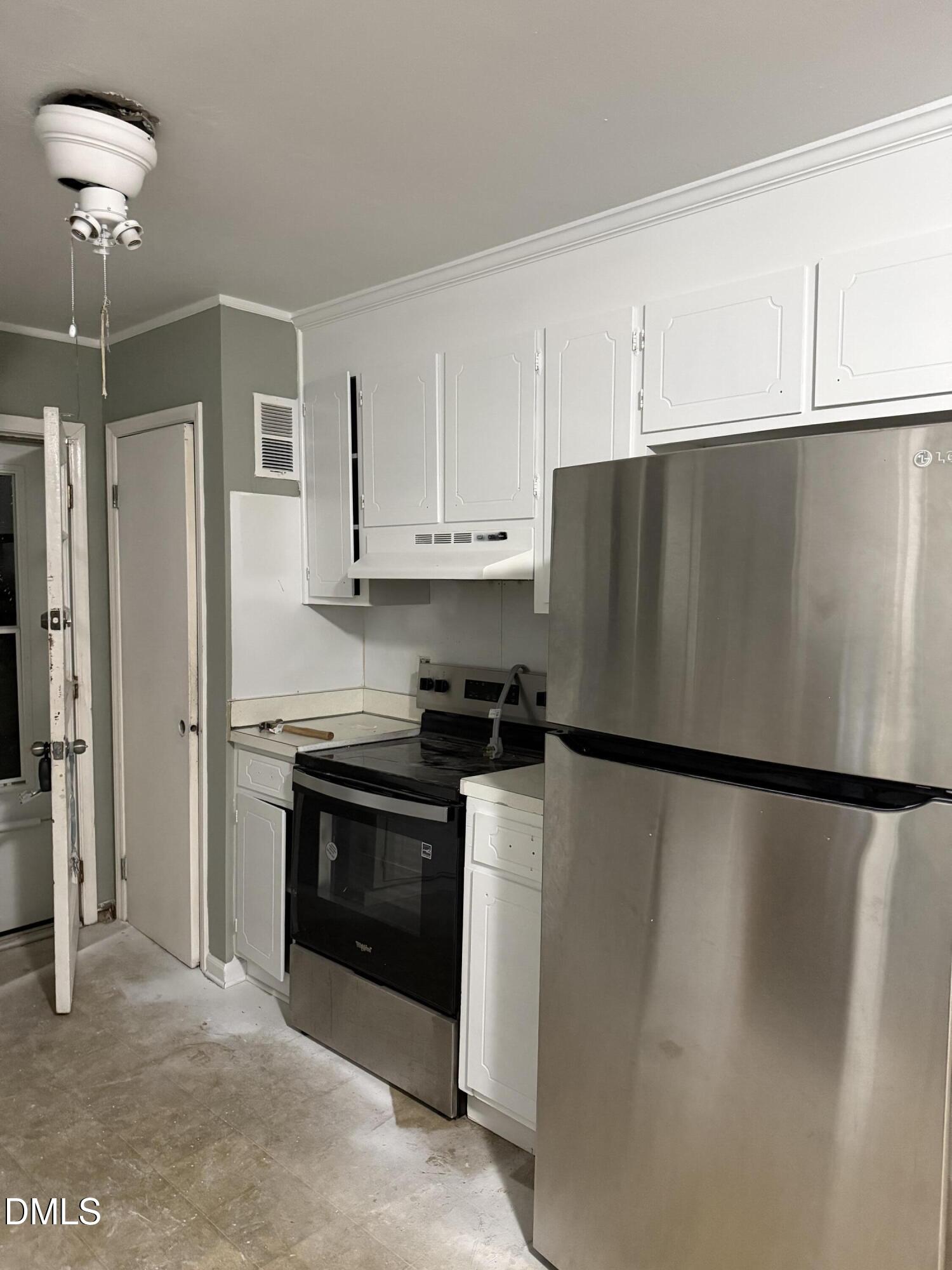 2800 Greenock Drive Raleigh, NC 27604 - Photo 3 of 20 a kitchen with stainless steel appliances granite countertop a refrigerator a stove a sink and dishwasher