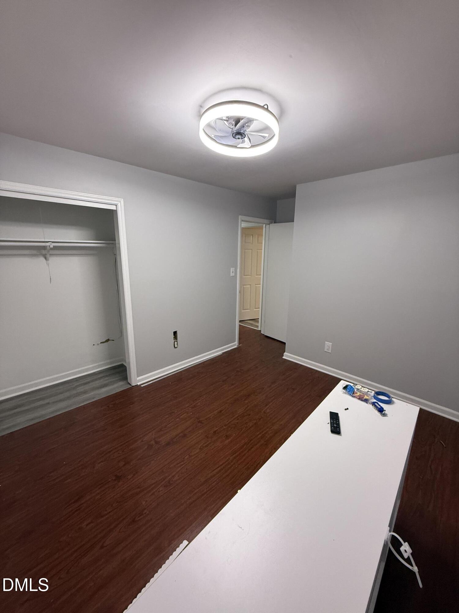 2800 Greenock Drive Raleigh, NC 27604 - Photo 5 of 20 a bedroom with a bed and a large window