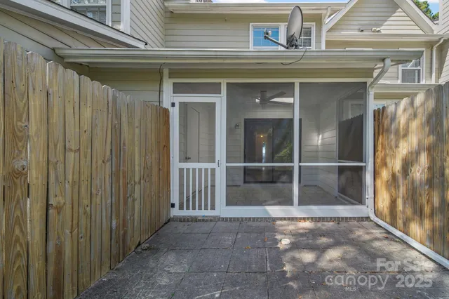 a view of entryway with a wooden door