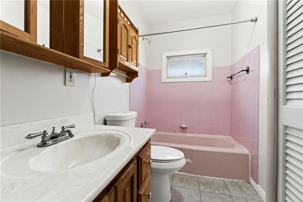 415 Gardner Street McKees Rocks, PA 15136 - Photo 22 of 22 a bathroom with a sink a toilet and shower