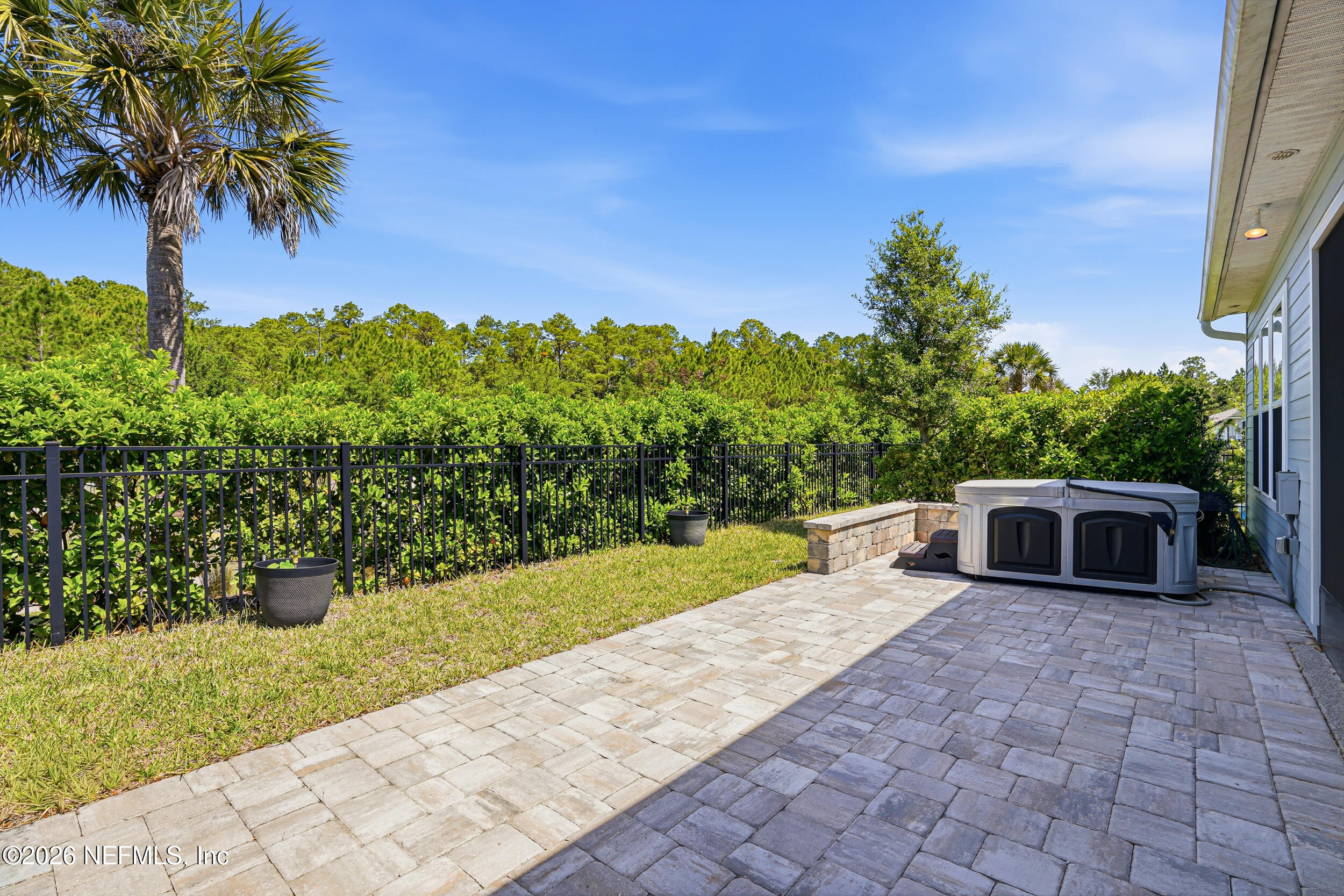 308 Rustic Mill Drive St. Augustine, FL 32092 - Photo 1 of 41 a view of a backyard with potted plants and a palm tree