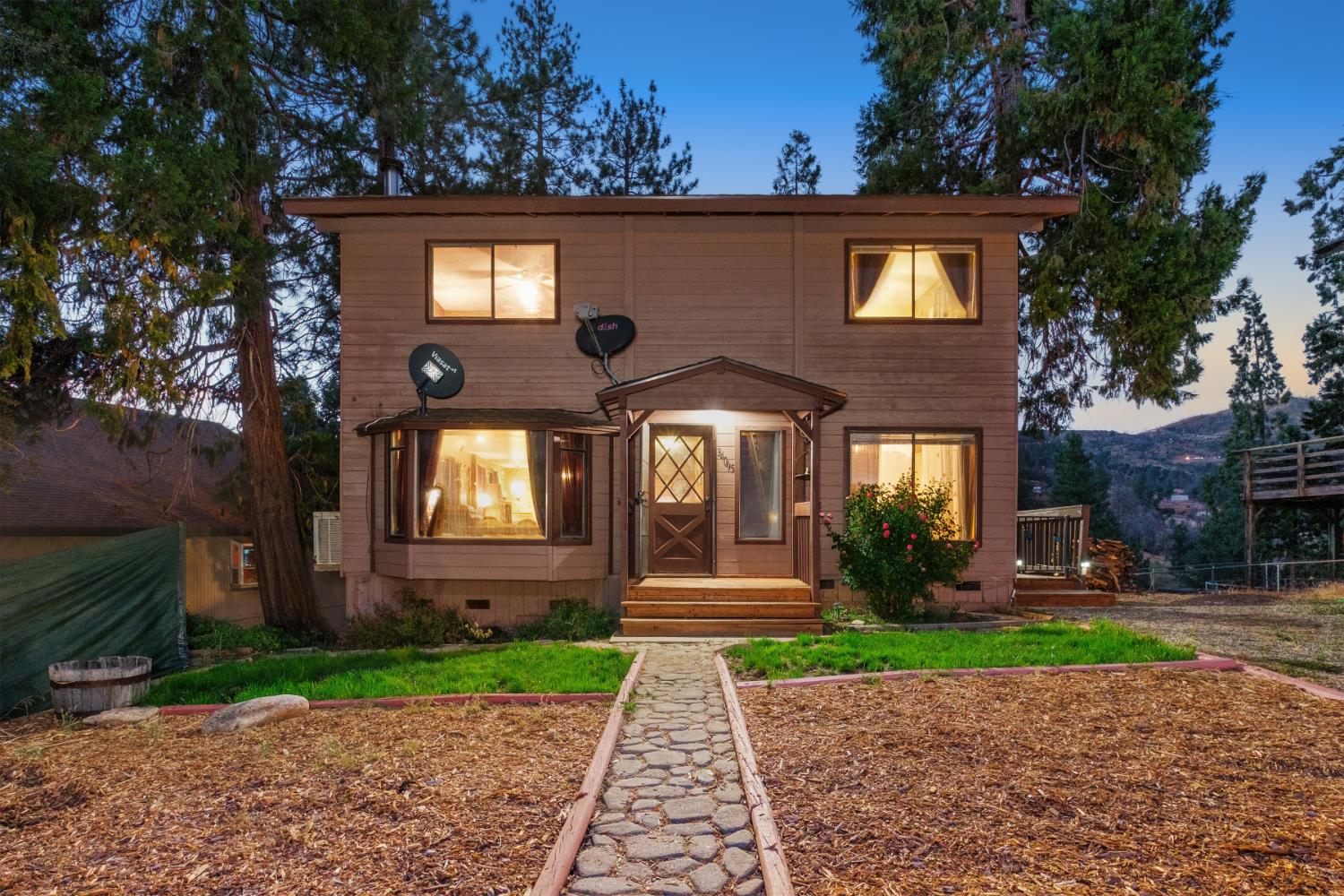 34065 Shaver Springs Road Auberry, CA 93602 - Photo 7 of 13 a front view of a house with garden
