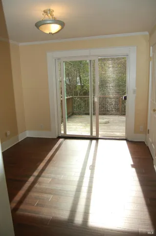 a view of an empty room and window