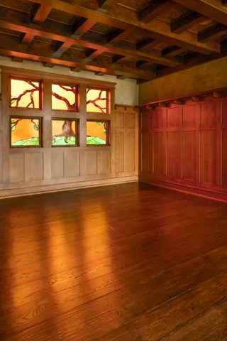 a view of fireplace with wooden floor