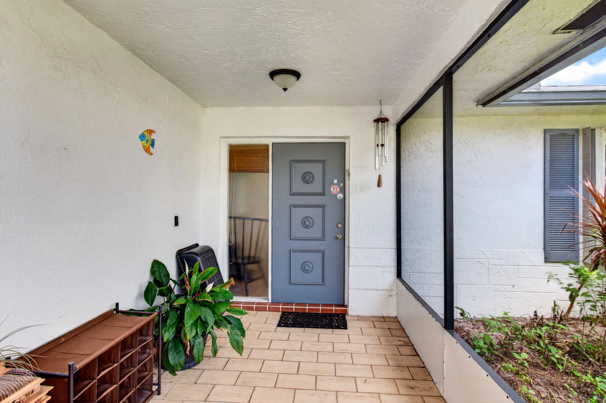 6038 Lasalle Road Delray Beach, FL 33484 - Photo 7 of 84 Main Entrance Screen-In Front Porch