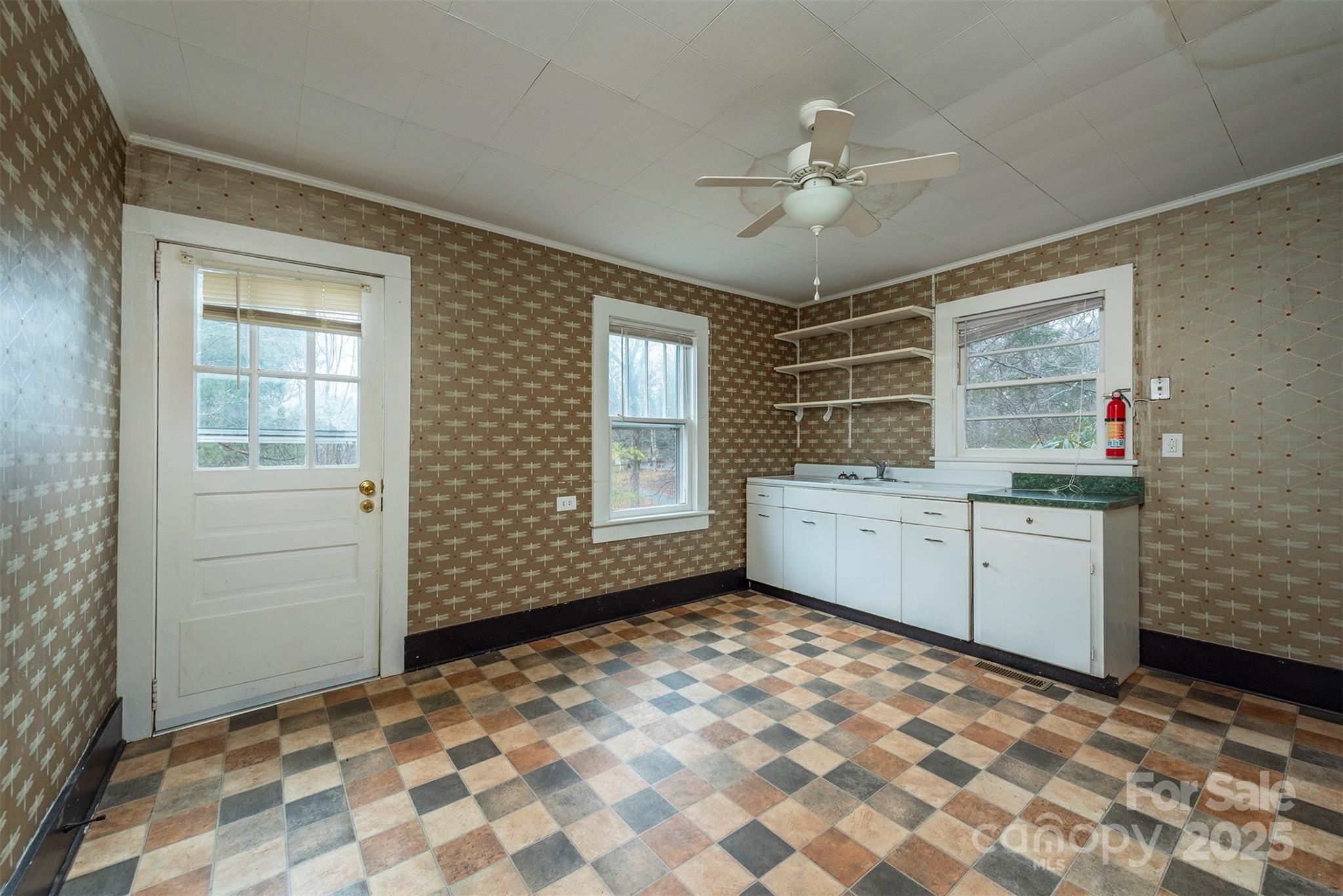 657 Old Fort Road Fairview, NC 28730 - Photo 15 of 30 a room with a stove and a window