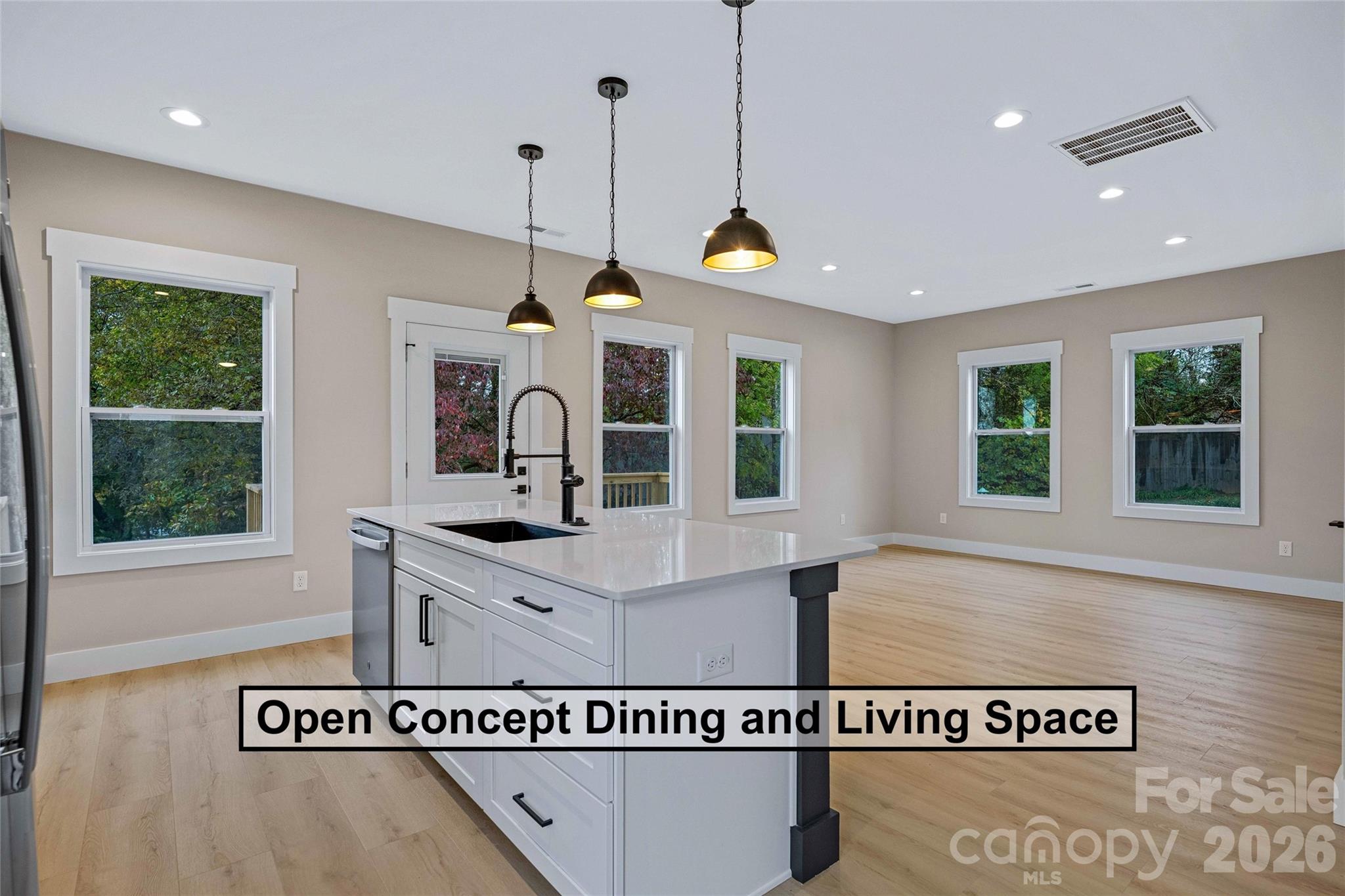 428 Hazel Mill Road Asheville, NC 28806 - Photo 16 of 46 a view of a kitchen with a window