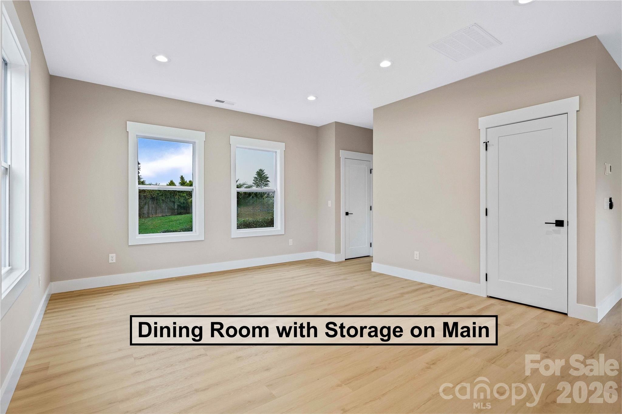 428 Hazel Mill Road Asheville, NC 28806 - Photo 21 of 46 a view of a hall with an empty space