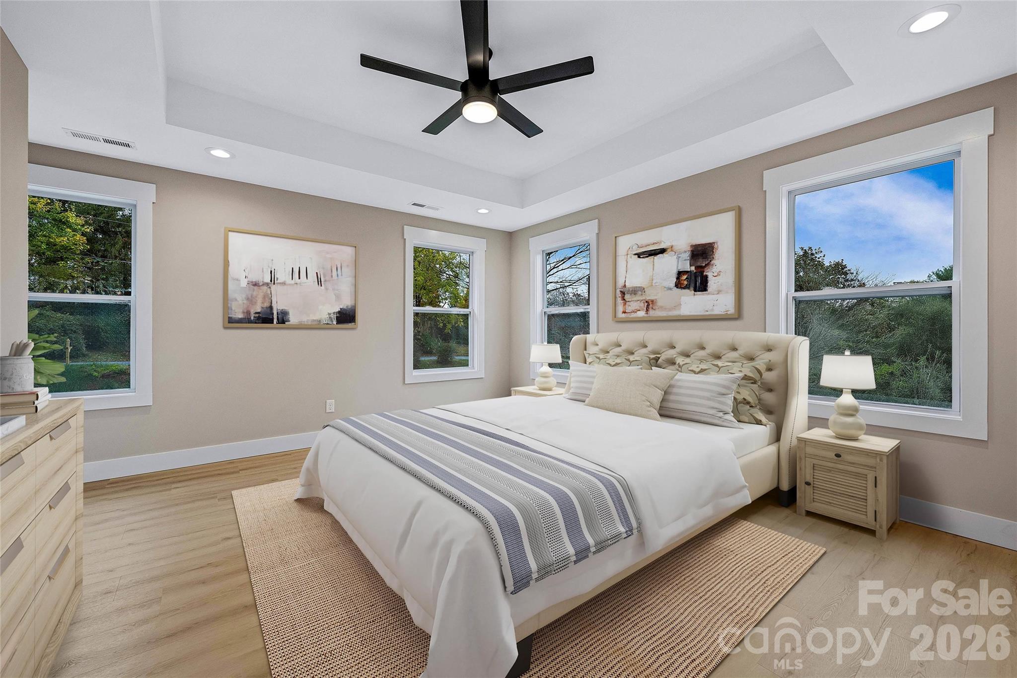 428 Hazel Mill Road Asheville, NC 28806 - Photo 29 of 46 a bedroom with a large bed and a window