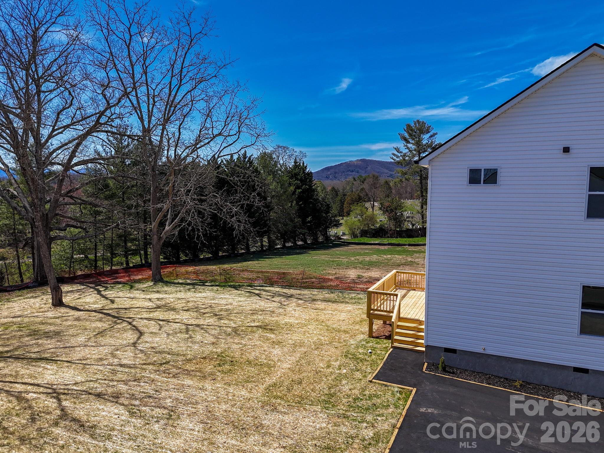 428 Hazel Mill Road Asheville, NC 28806 - Photo 4 of 46 a view of a backyard with wooden fence